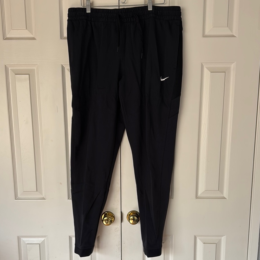 NWT Nike Black Sweatpants with Tapered Leg Design